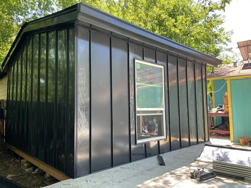 Black standing seam metal wall panels for Metal Roof Installation in Huntingburg