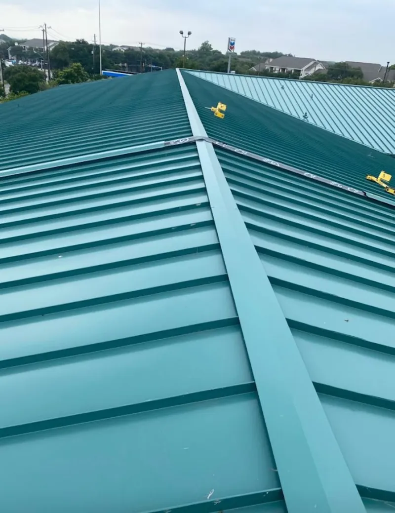 Green commercial metal roof ridge and valley for Metal Roof Repair in Huntingburg
